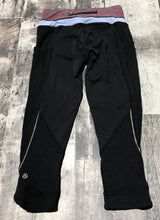 Load image into Gallery viewer, lululemon black/pink/blue cropped leggings - Hers size 4
