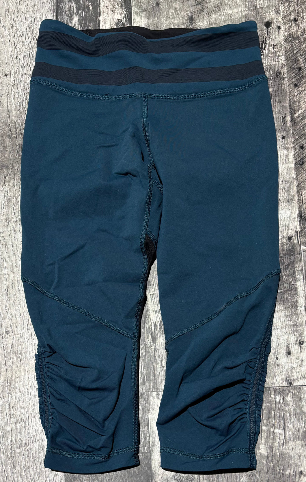 lululemon teal/black cropped leggings - Hers size 4