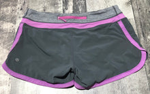 Load image into Gallery viewer, lululemon grey/purple athletic shorts - Hers size 8
