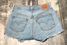 Load image into Gallery viewer, Levi light blue button fly high rise denim shorts - Hers size 27 we
