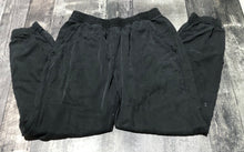 Load image into Gallery viewer, lululemon black loose jogger pants - Hers size 8
