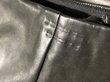 Load image into Gallery viewer, Babaton black fake leather leggings - Hers size 10

