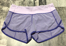 Load image into Gallery viewer, lululemon lavender/dark purple shorts - Hers size 4
