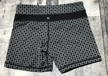 Load image into Gallery viewer, lululemon grey/black shorts - Hers size 4
