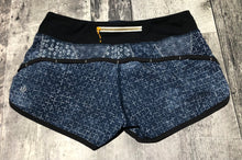 Load image into Gallery viewer, lululemon blue/black shorts - Hers size 4
