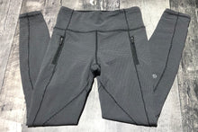 Load image into Gallery viewer, lululemon grey high rise leggings - Hers size 6
