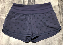 Load image into Gallery viewer, lululemon purple shorts - Hers size 2

