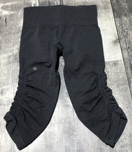 Load image into Gallery viewer, lululemon dark grey capris leggings - Hers size 4
