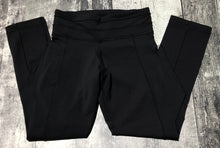 Load image into Gallery viewer, lululemon black mid rise leggings - Hers size 2
