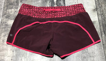 Load image into Gallery viewer, lululemon burgundy/red shorts - Hers size 8
