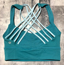 Load image into Gallery viewer, lululemon teal/turquoise sports bra - Hers size 4
