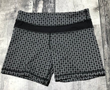 Load image into Gallery viewer, lululemon grey/black shorts - Hers size 4
