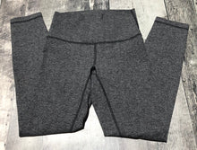 Load image into Gallery viewer, lululemon grey high rise leggings - Hers size 4
