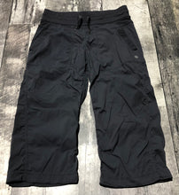 Load image into Gallery viewer, lululemon dark grey capri pants - Hers size 6
