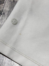 Load image into Gallery viewer, lululemon off white athletic shorts - Hers size 4

