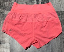 Load image into Gallery viewer, lululemon peach athletic shorts - Hers size 2
