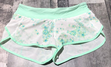Load image into Gallery viewer, lululemon white/mint athletic shorts - Hers size 6

