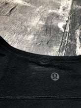 Load image into Gallery viewer, lululemon black asymmetrical long sleeve shirt - Hers size approx S/M
