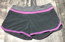 Load image into Gallery viewer, lululemon grey/purple athletic shorts - Hers size 8
