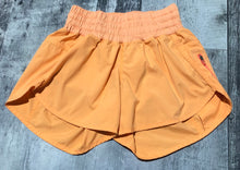 Load image into Gallery viewer, lululemon orange shorts - Hers size 4

